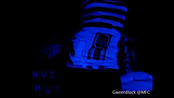 Dancing Under The Black Light With His Buttocks Exposed