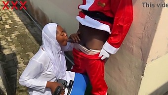 A Joyful Christmas Encounter With Santa And A Seductive Woman Wearing A Hijab. Subscribe To Red For More