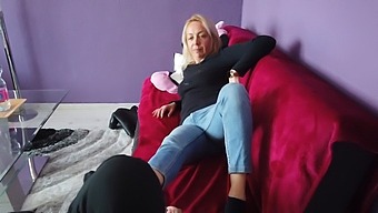 A Blonde Woman Receives Foot Worship For The First Time